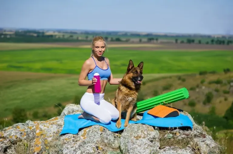 yoga practice outdoors mature german couple
