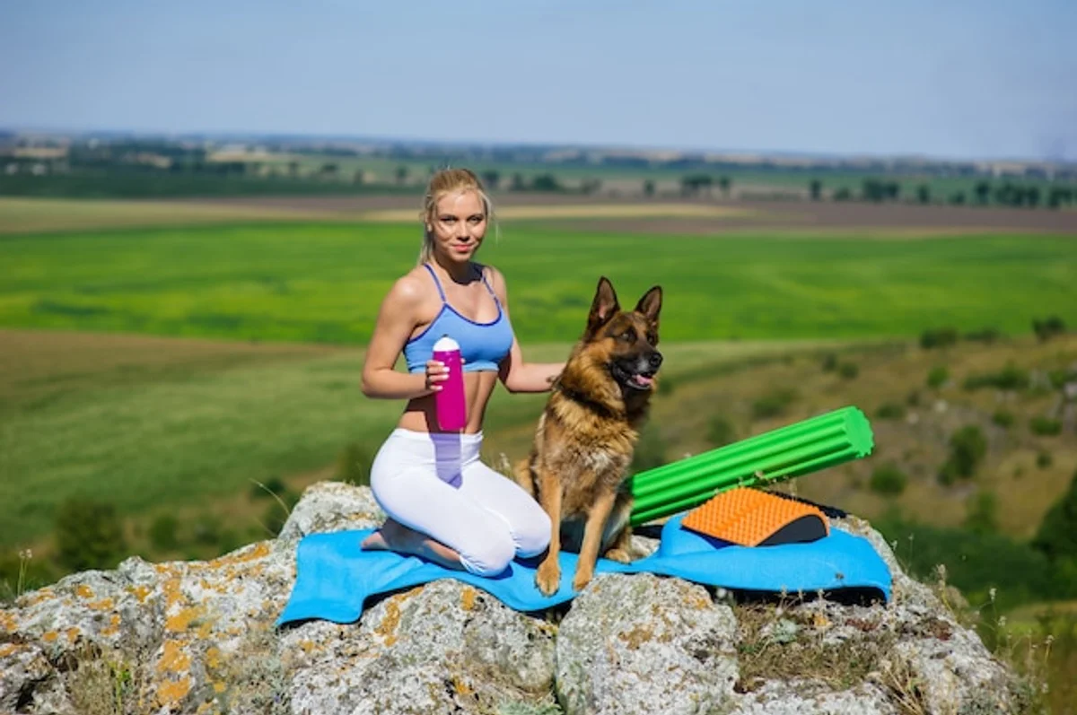 yoga practice outdoors mature german couple