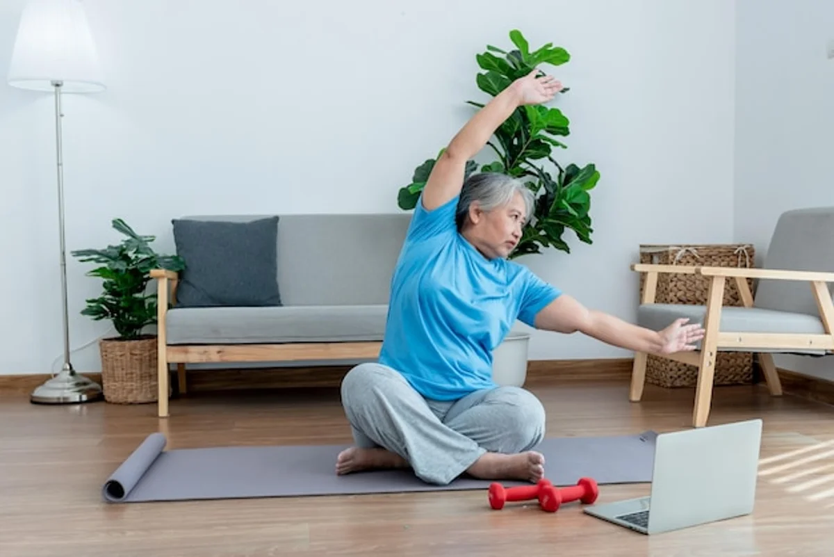 elderly woman chair yoga home living room light