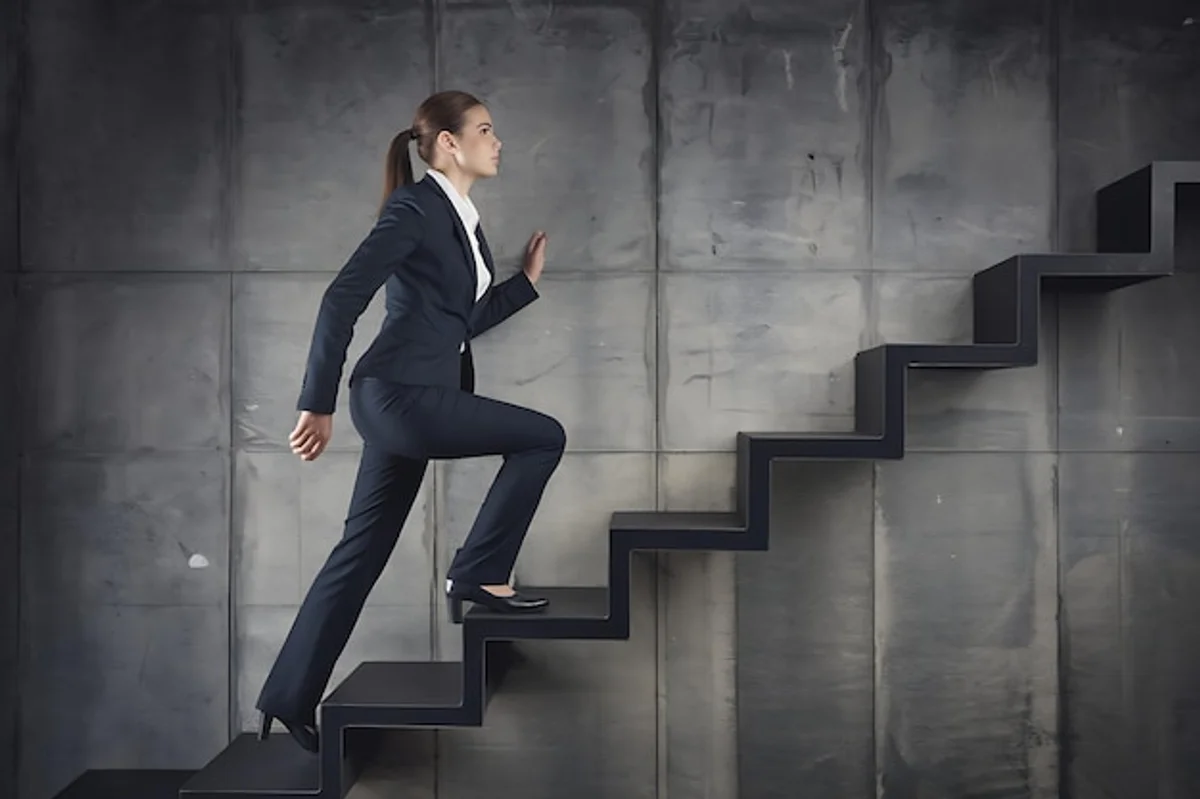 business person climbing stairs modern office fitness