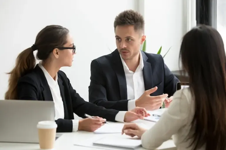 people discussing communication strategies in the office