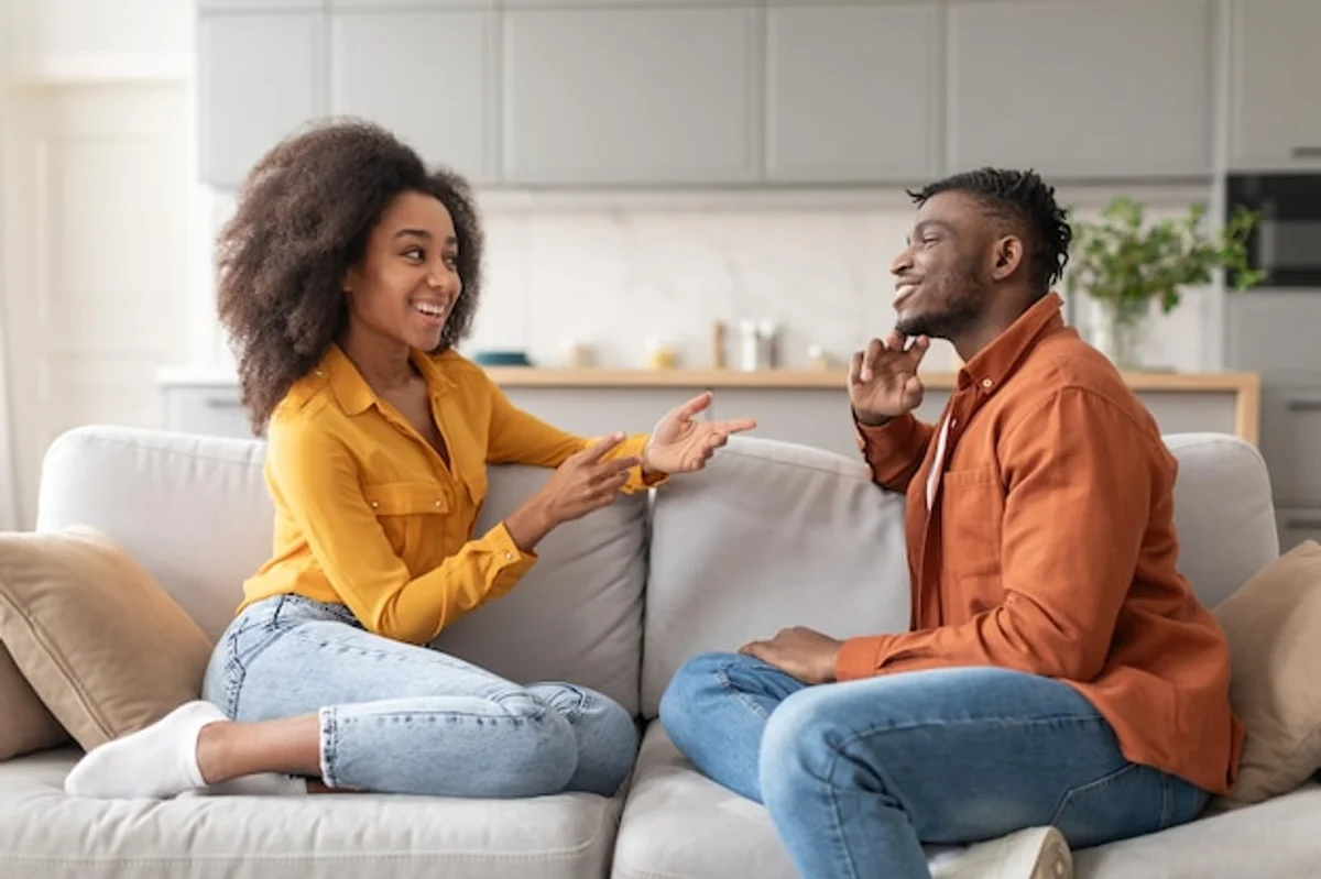 couple talking on couch clear communication