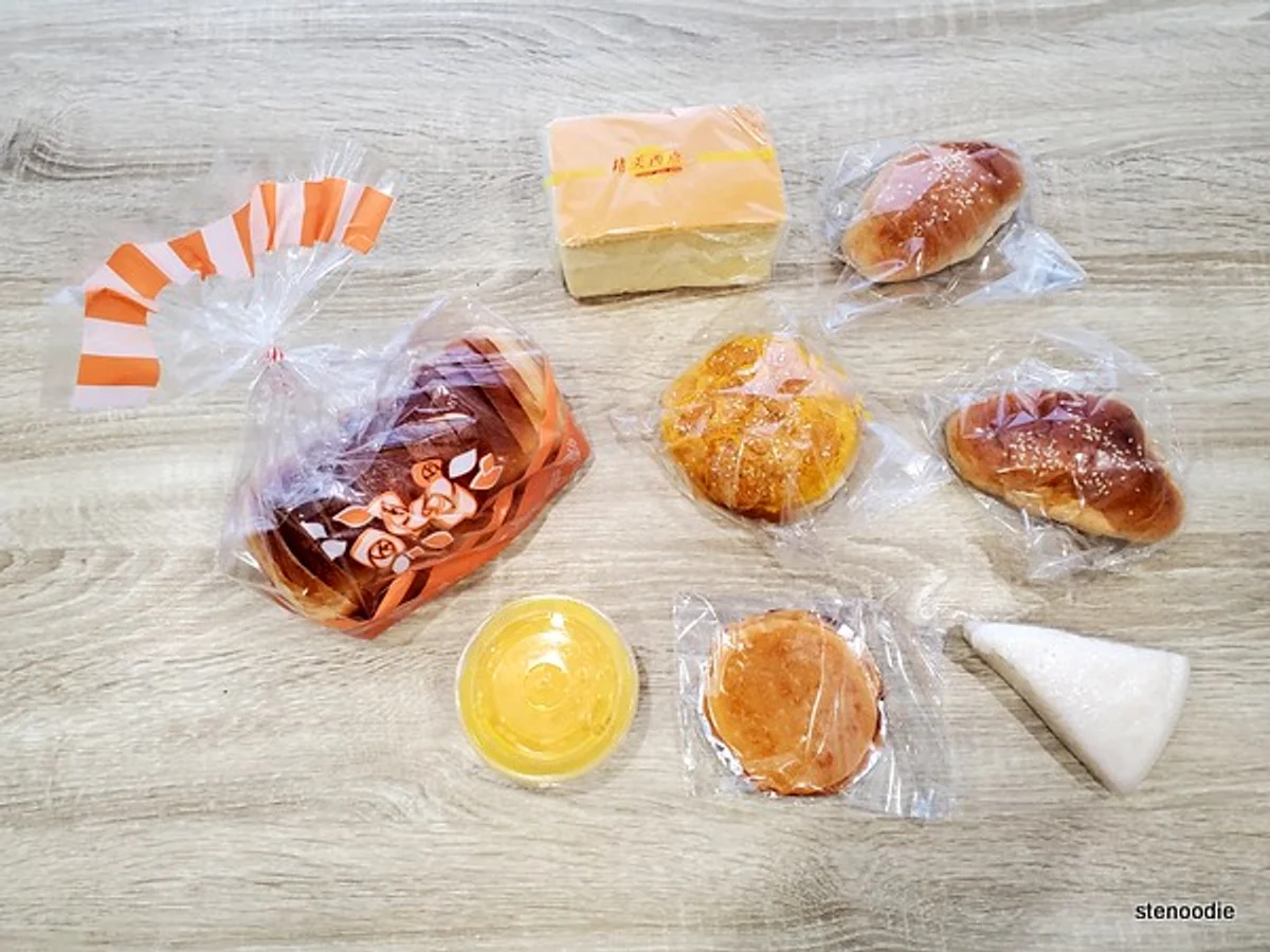 hands holding surprise food bag with too good to go logo near german bakery