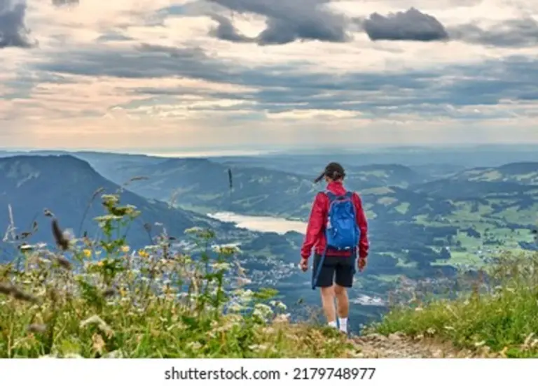 elderly hikers light backpacks Bavaria scenic