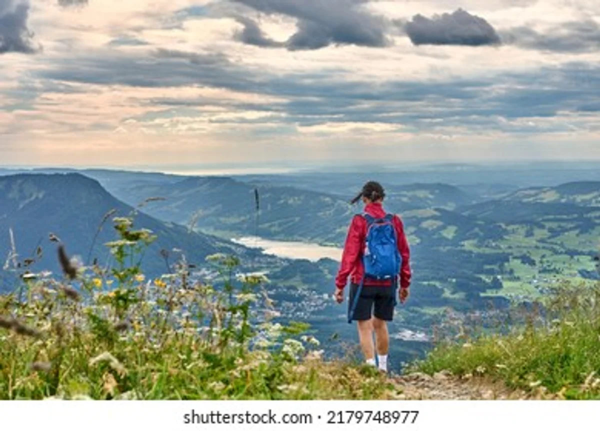 elderly hikers light backpacks Bavaria scenic