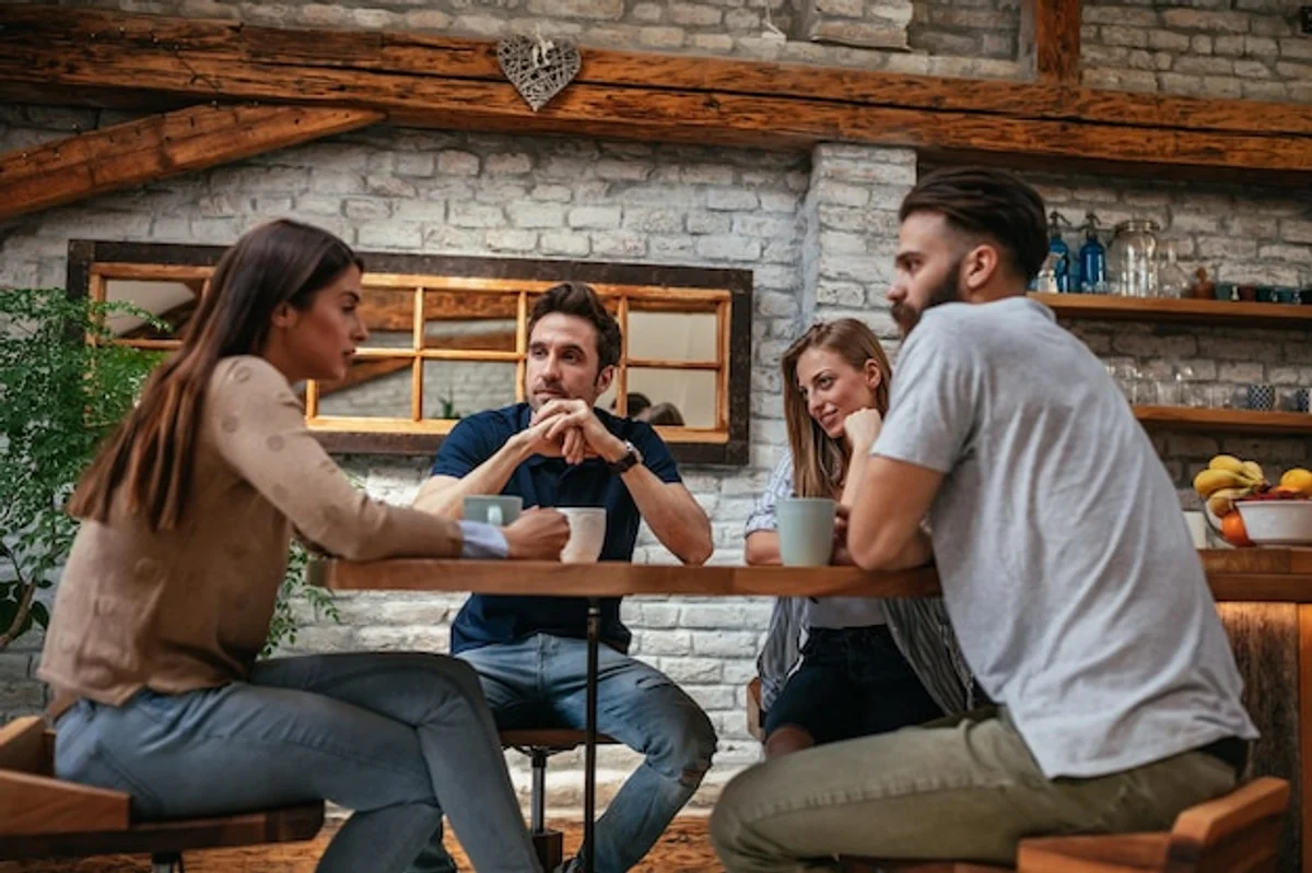 friends talking cafe Germany