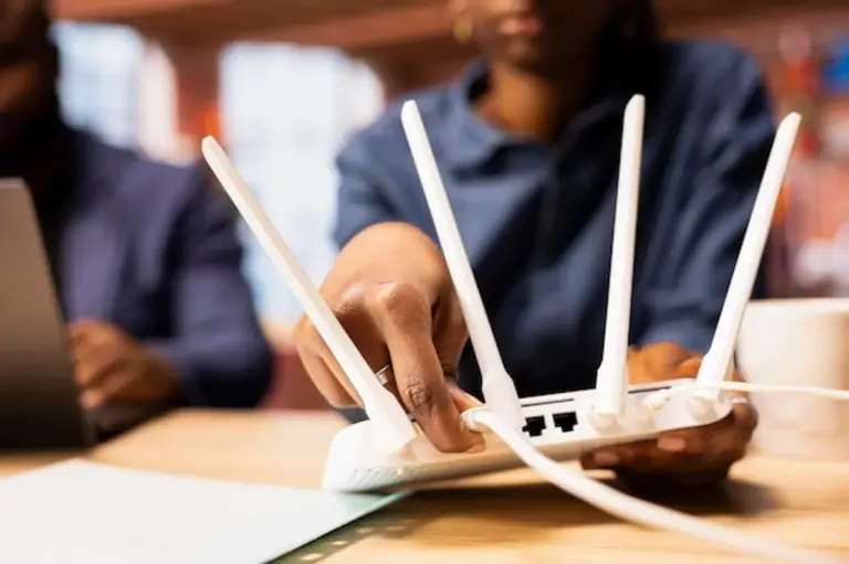 resetting WiFi router person home