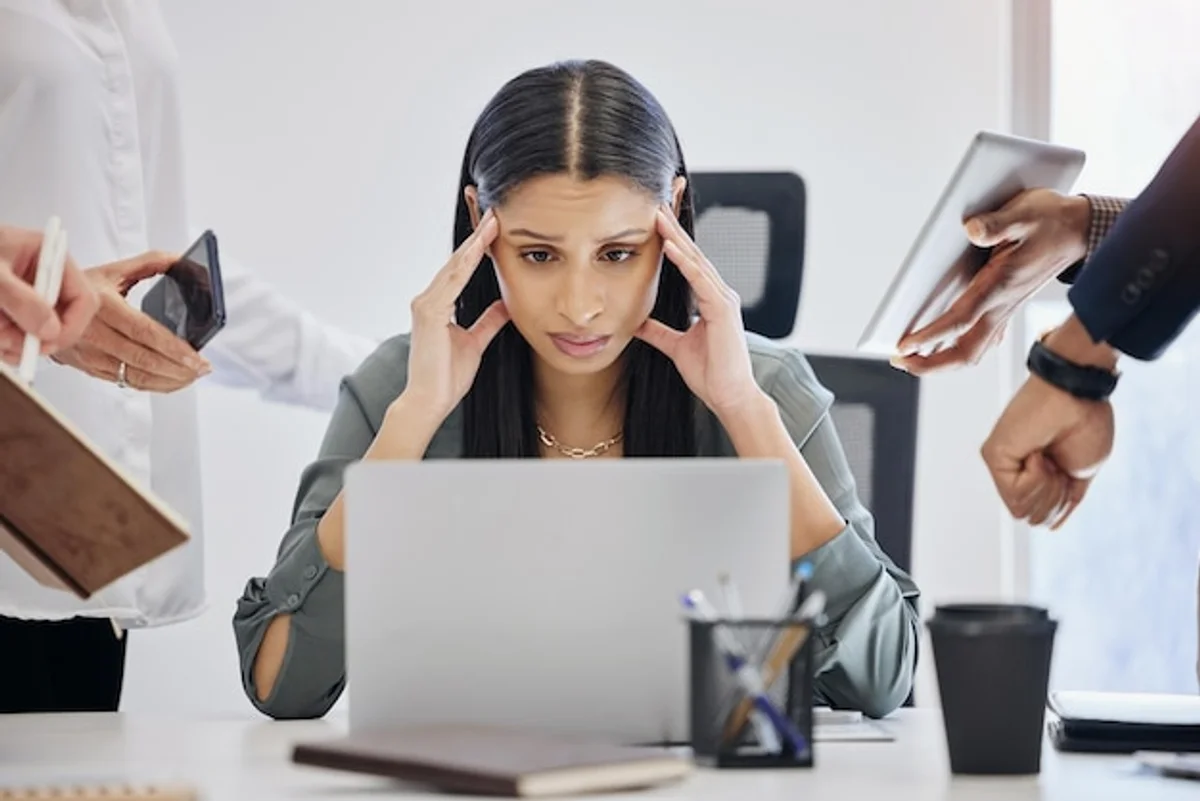 busy office desk multitasking stress