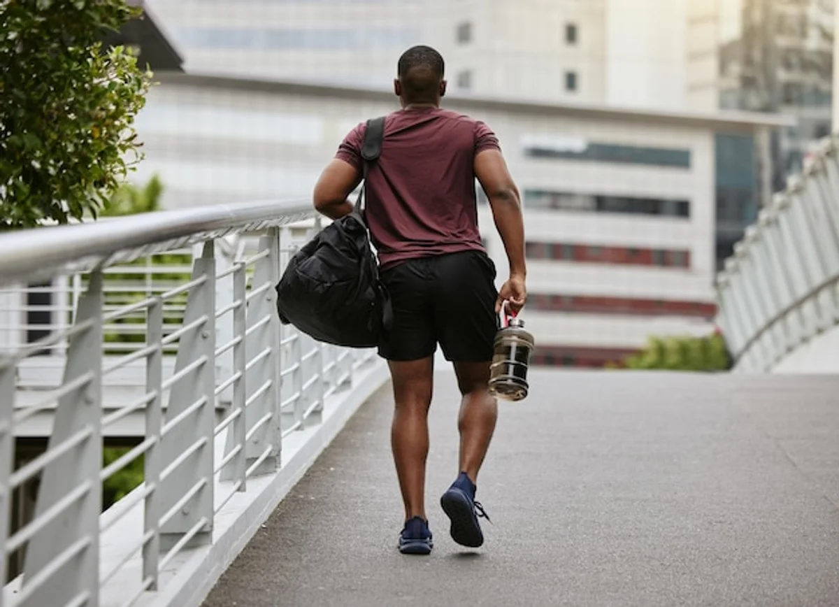home workout with water bottles and backpack weights