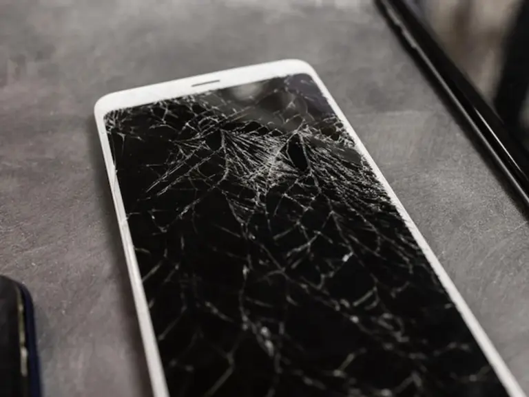 close up smartphone screen scratch repair home
