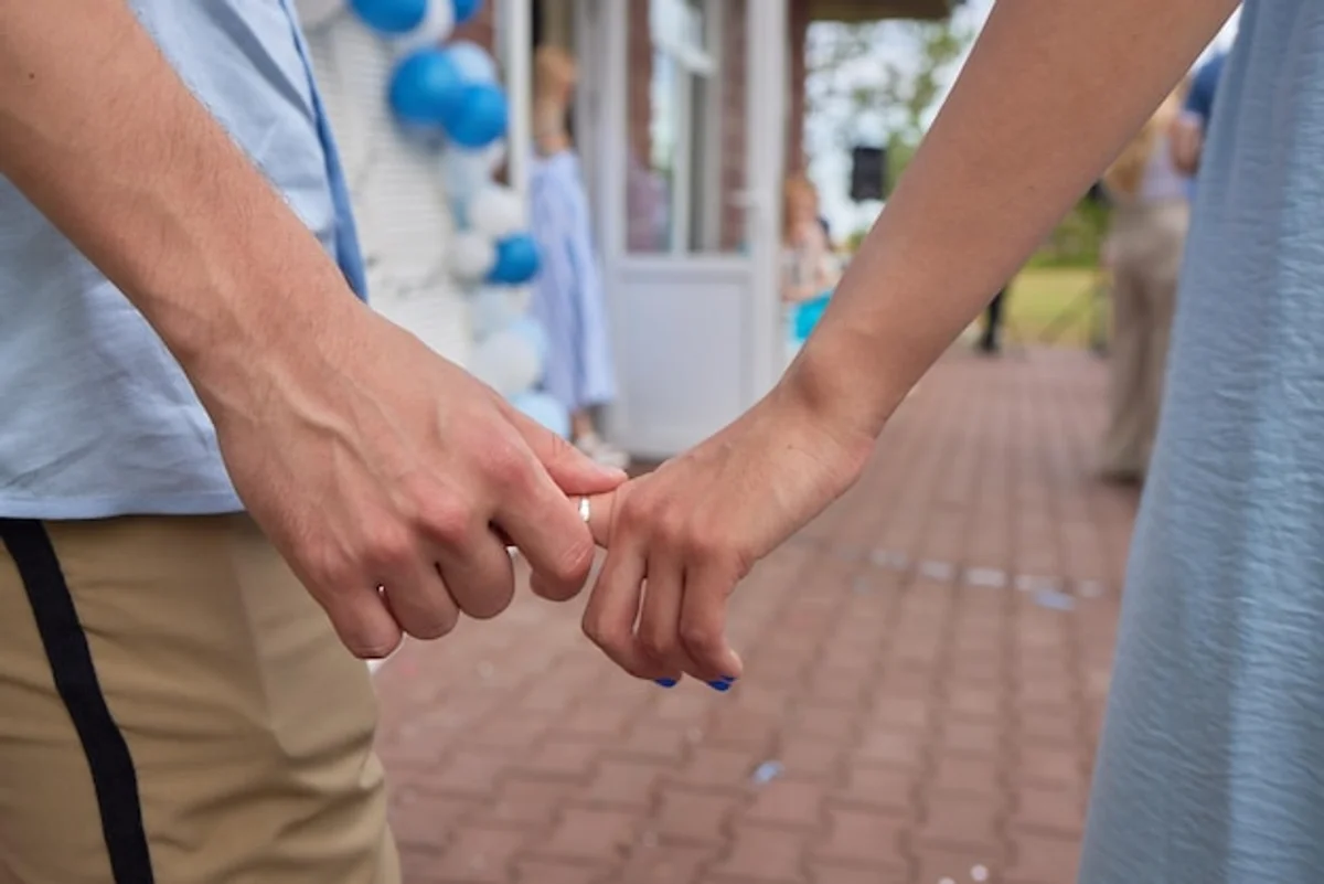 close up couple's hands gentle touch connection emotion