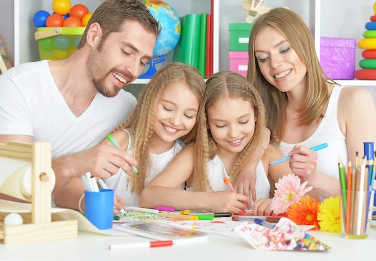 family painting together clean table