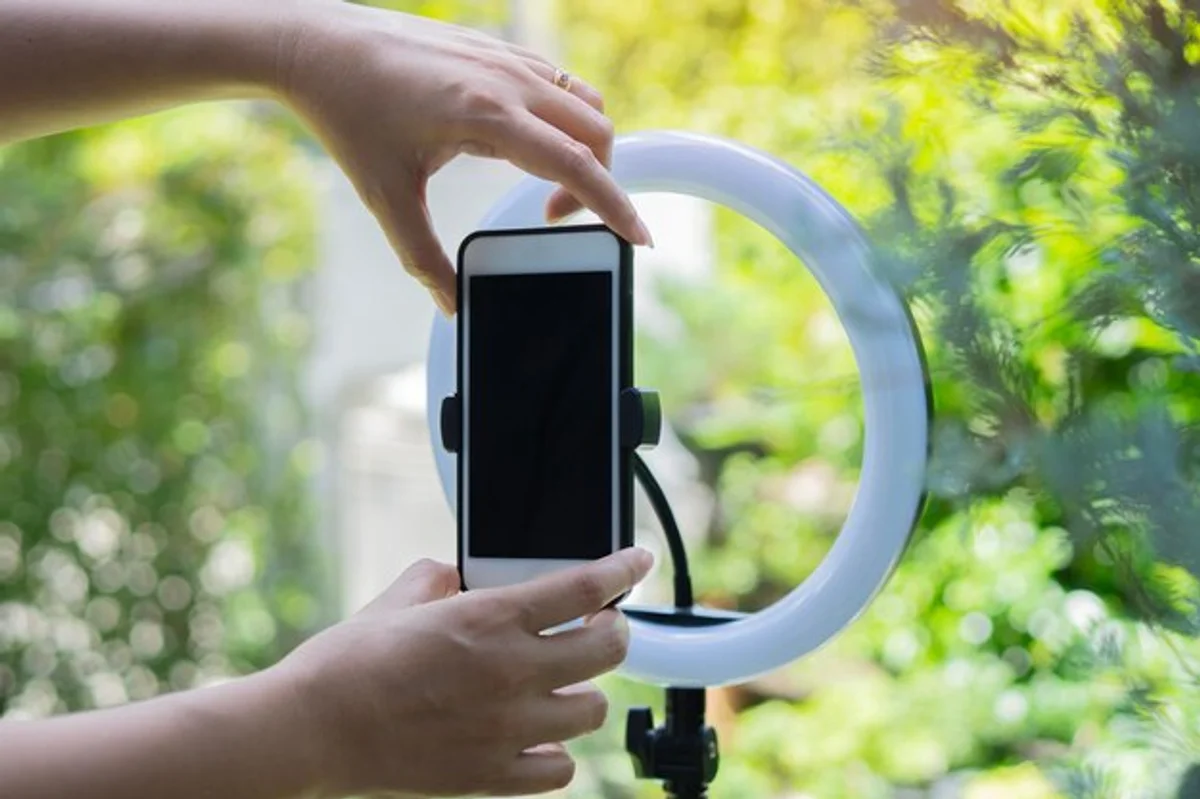 smartphone brightness adjustment hand