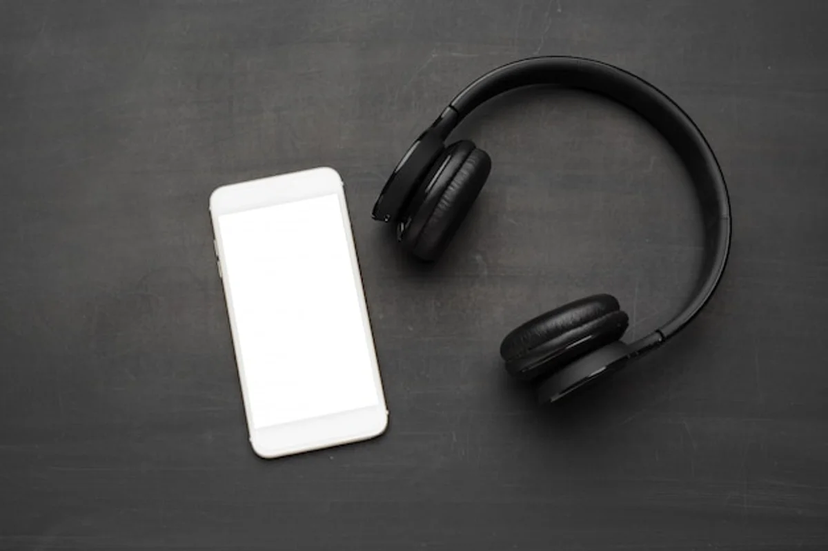bluetooth device pairing smartphone headphones modern flat lay