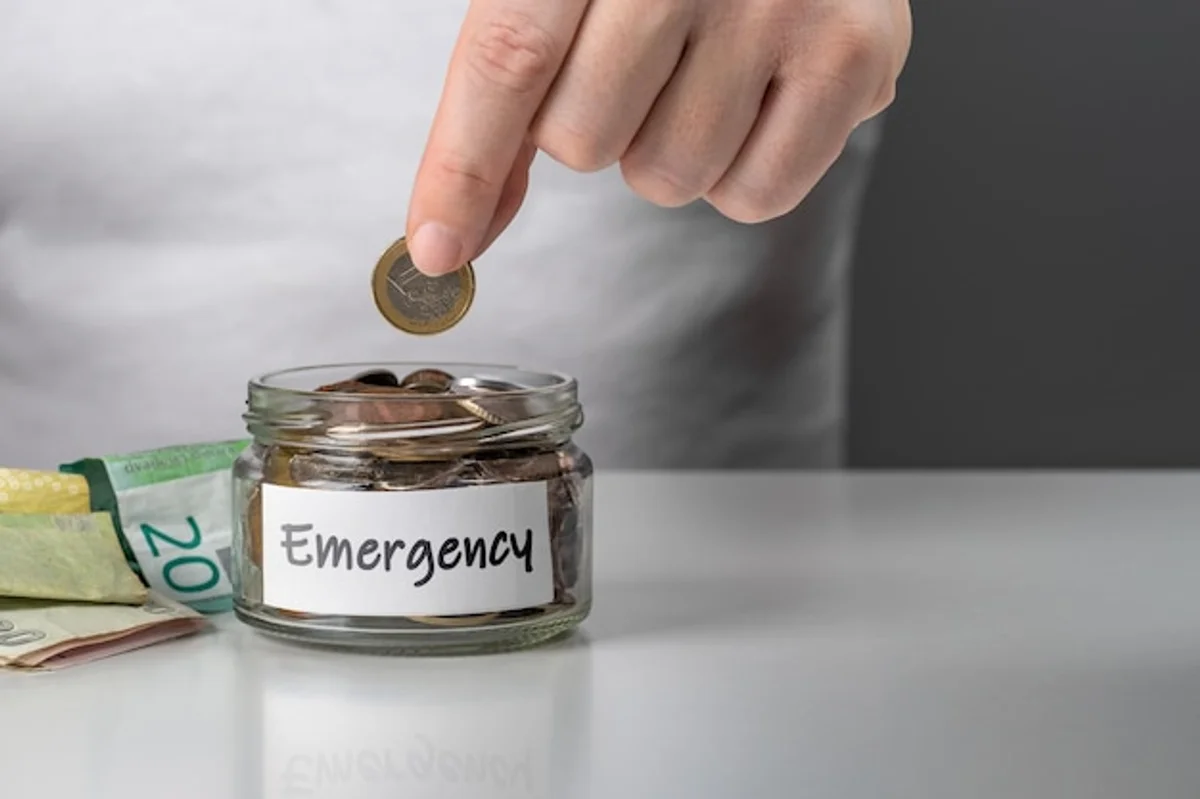 euro coins saving jar emergency fund