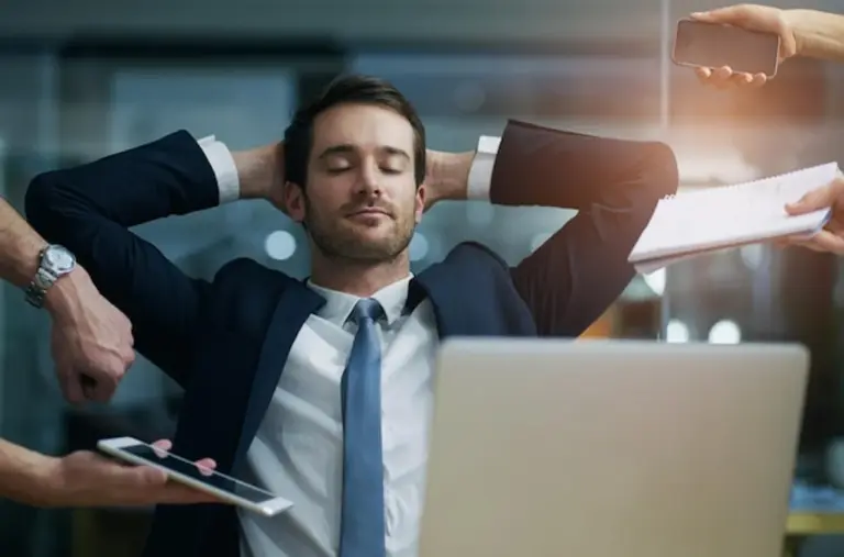 businessman frustrated multitasking office productivity