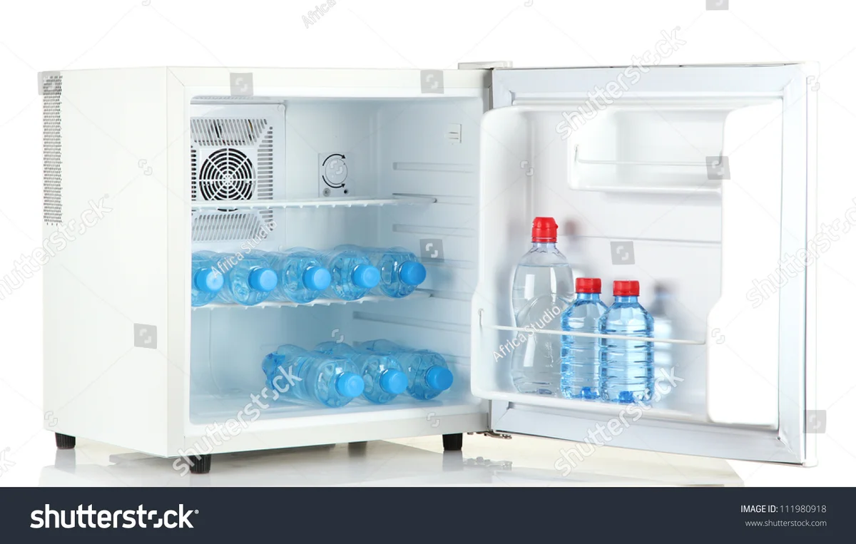 open fridge with infused water bottles germany minimalist lifestyle