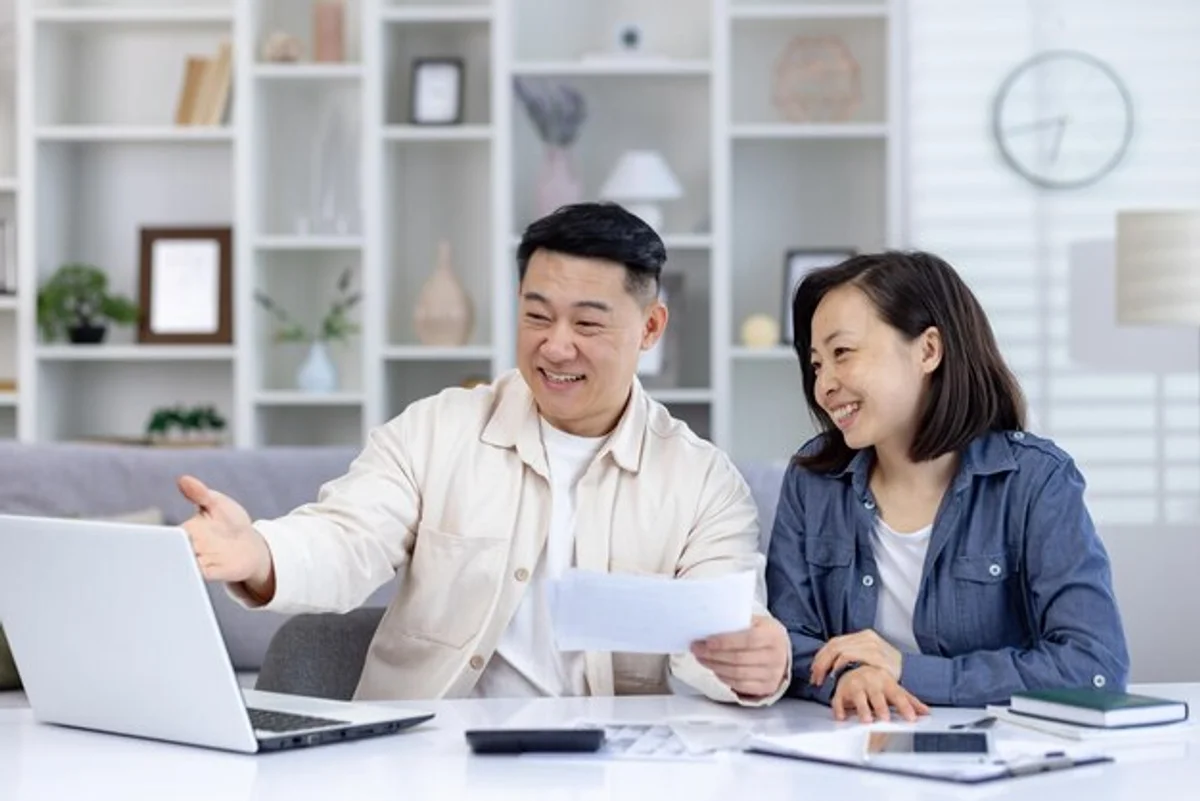 German family budgeting at home table