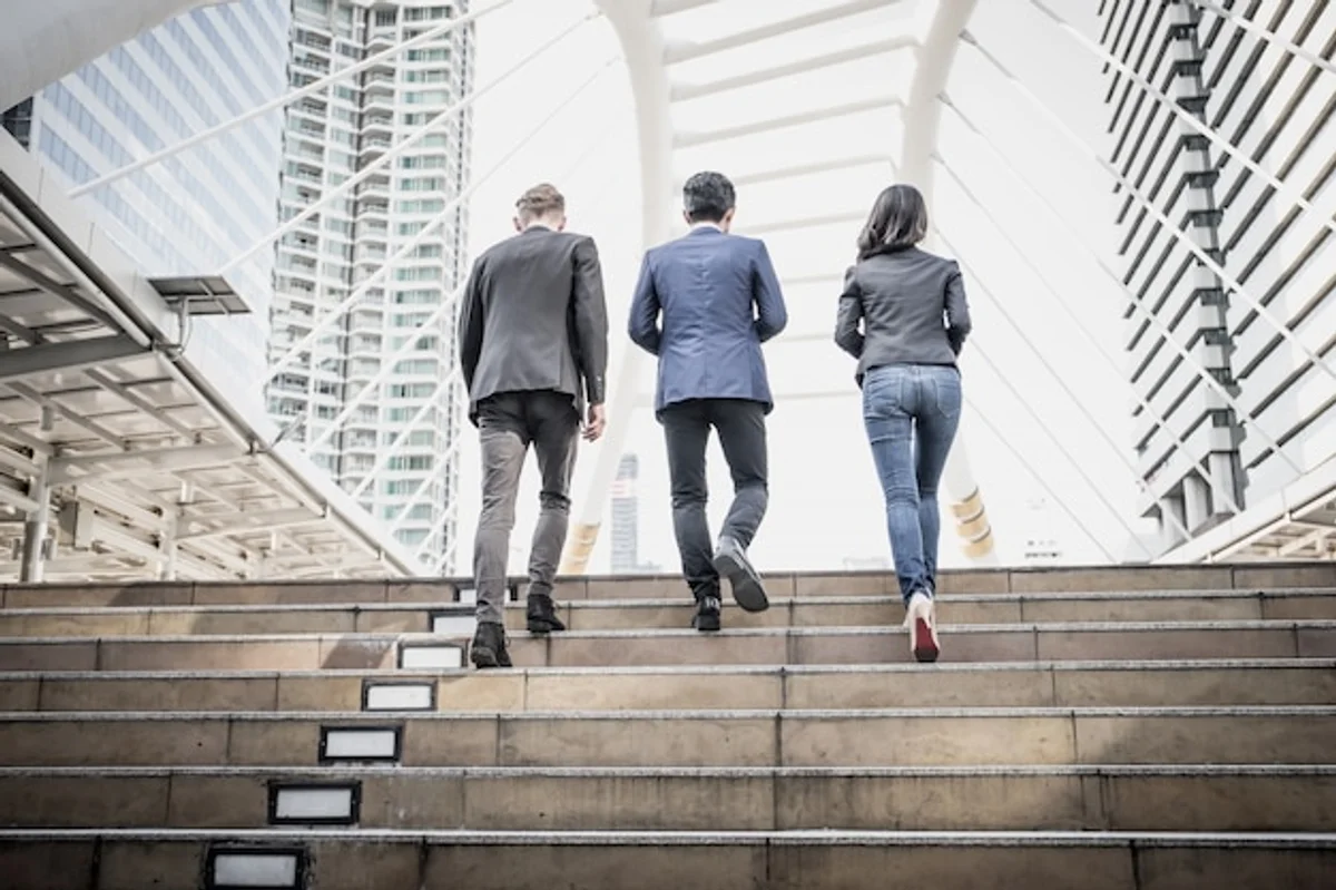 modern busy people moving stairs Germany