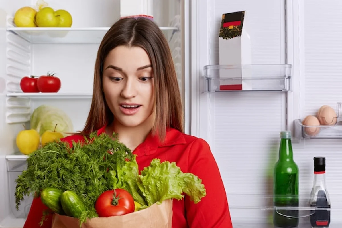 fresh lettuce in fridge kitchen paper
