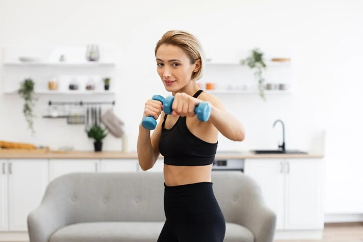 home workout woman dumbbell living room bright