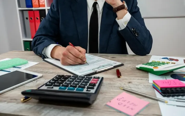 standing desk mature businessman productivity office Germany