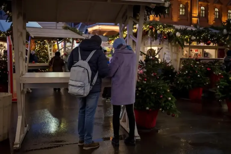 happy senior couple travel germany backpack park autumn