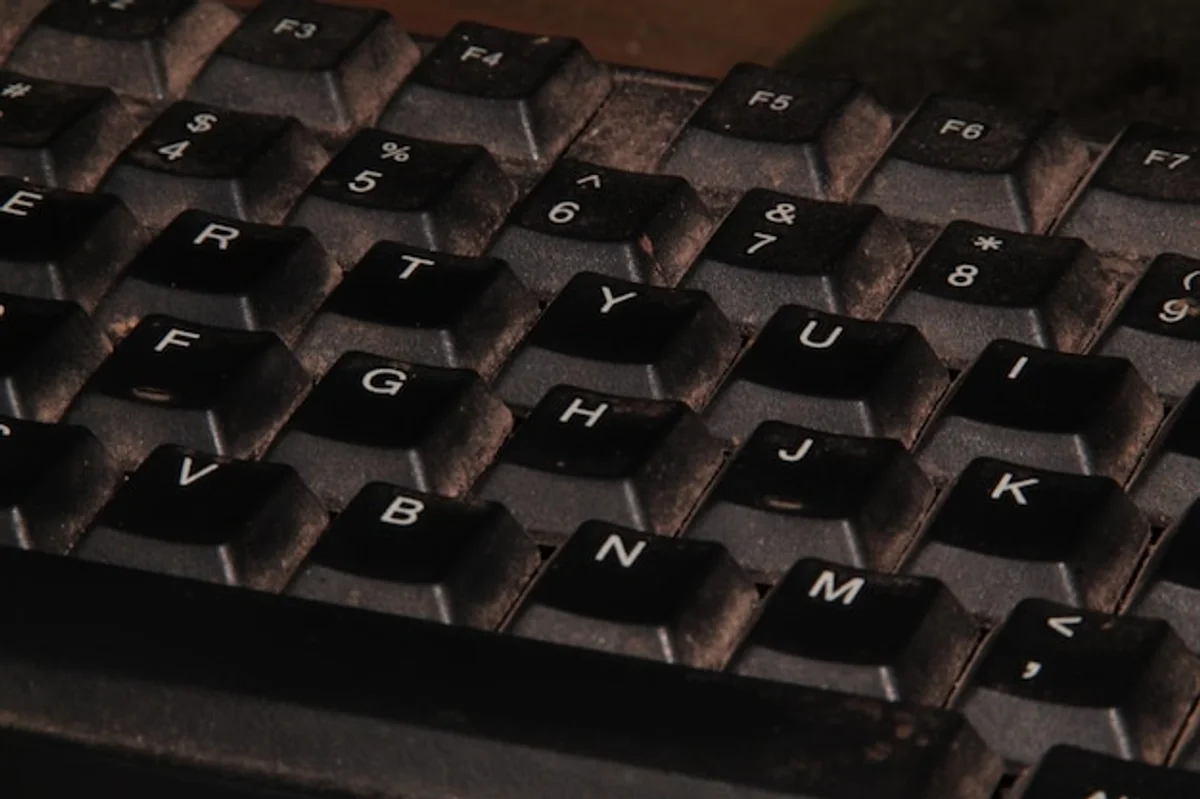 dirty keyboard close up dust and crumbs