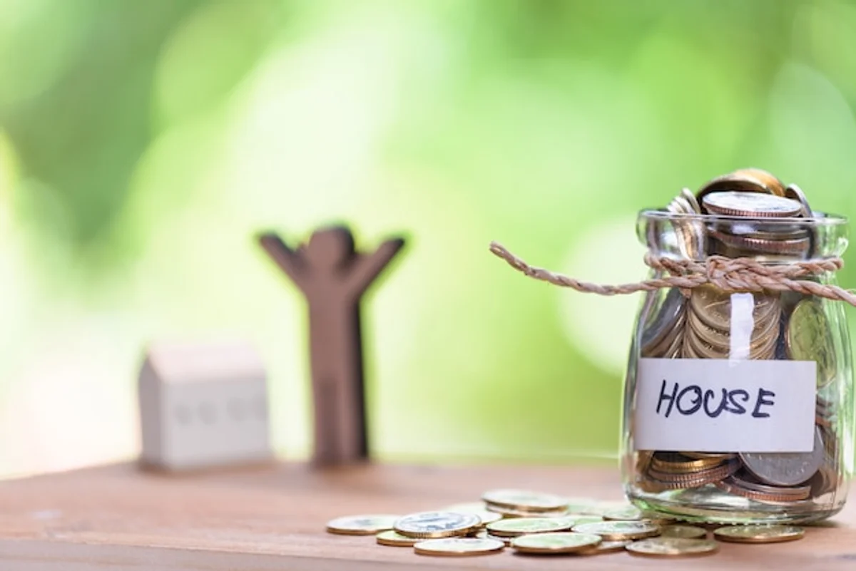 saving money household change jar table