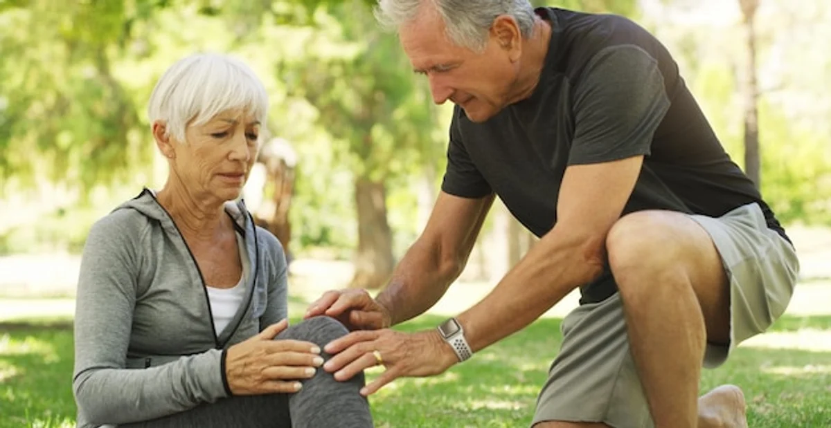 elderly couple exercising outdoors bones health