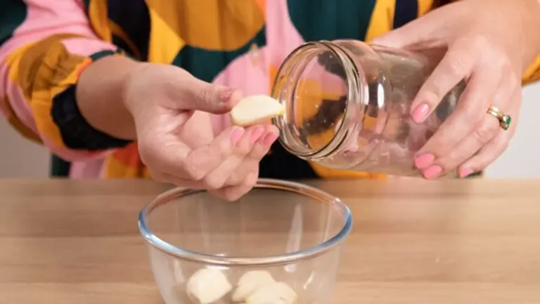 garlic peeling hack kitchen glass jar hands
