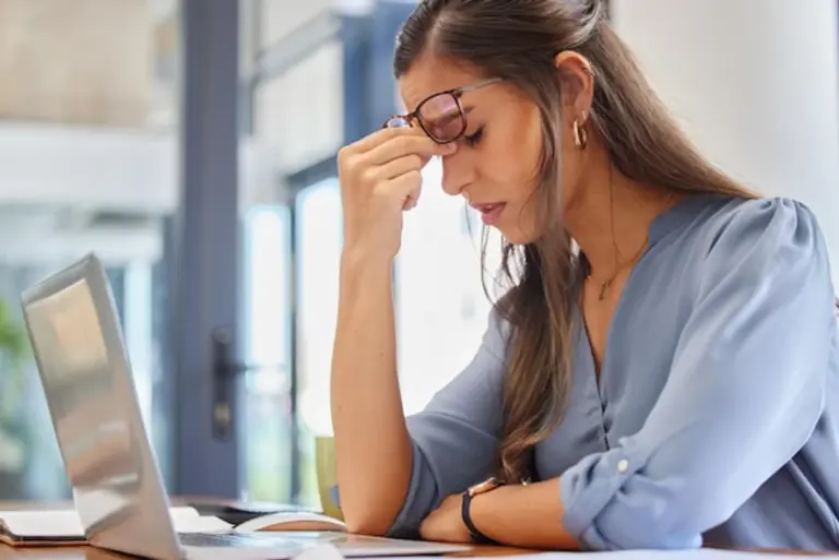overworked tired remote worker home office burnout prevention