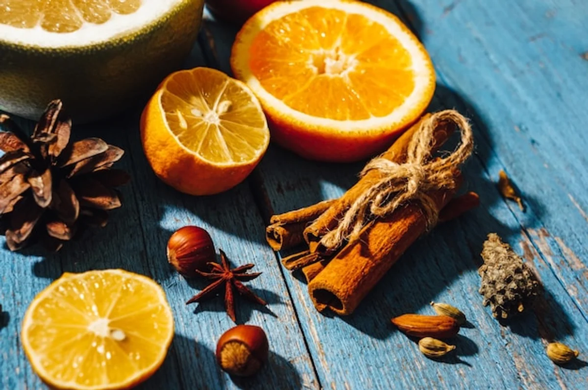 herbs and citrus fruits on wooden table