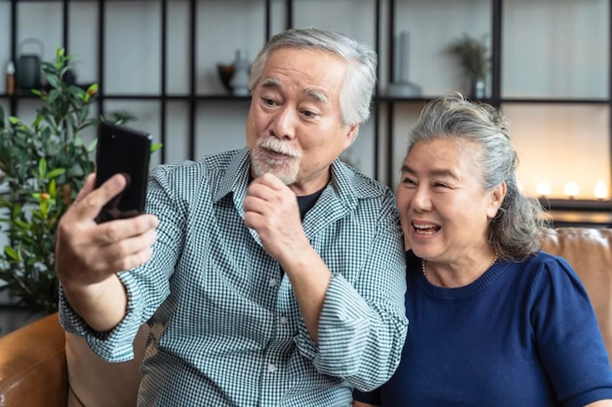 parents using old smartphone as modern baby monitor