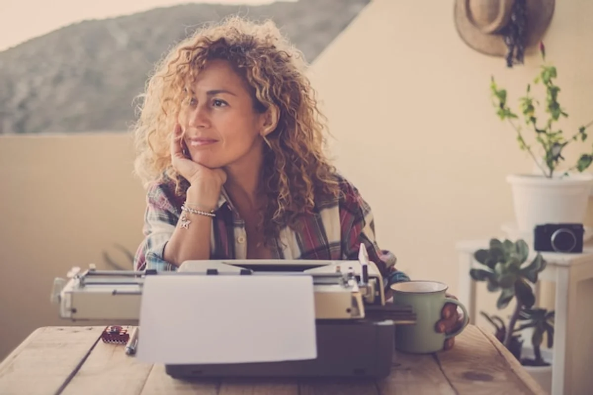 relaxed writer taking break from writing coffee