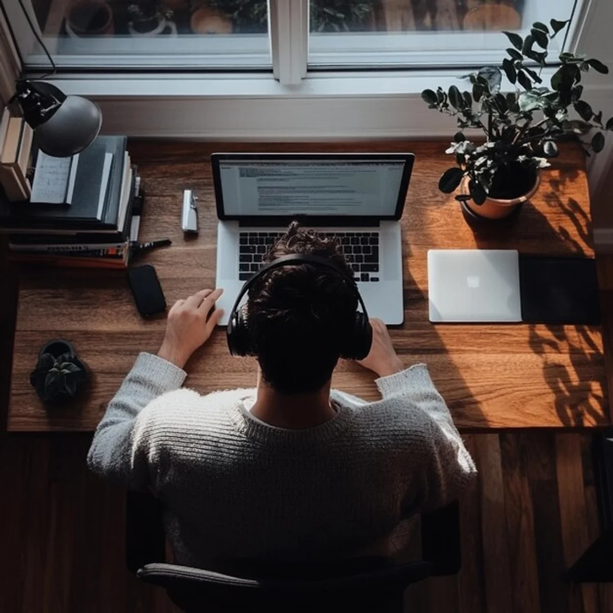 focused person working at desk minimal distractions