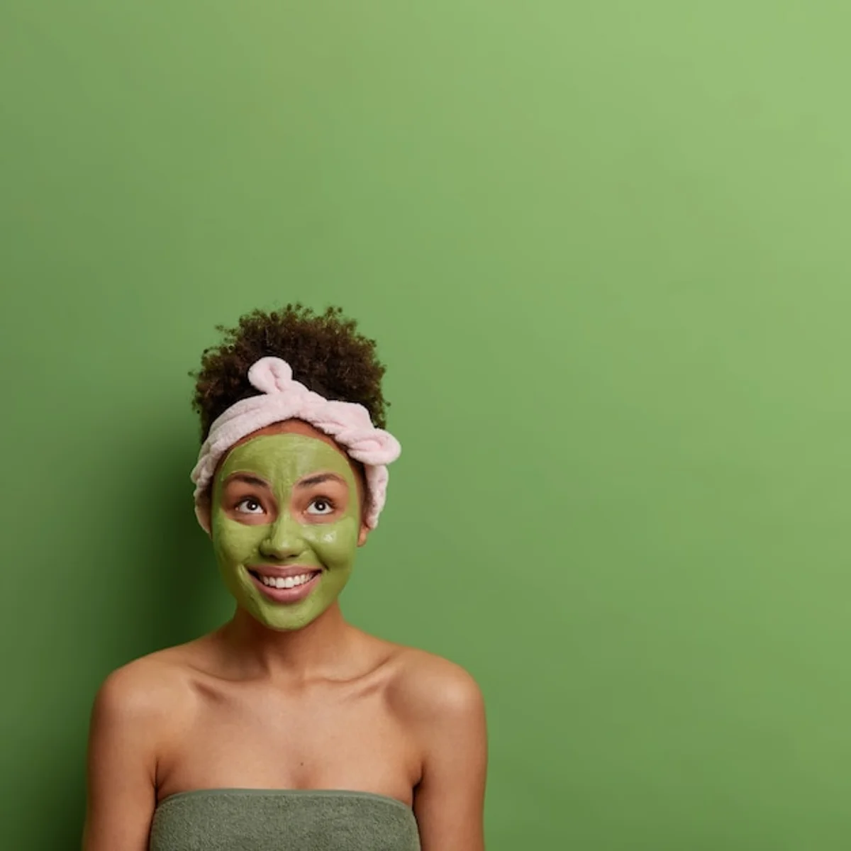 woman applying banana face mask happy home natural skincare