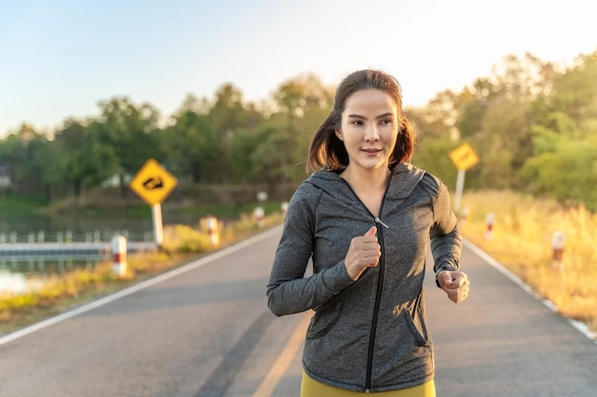 runners warm up park sunrise