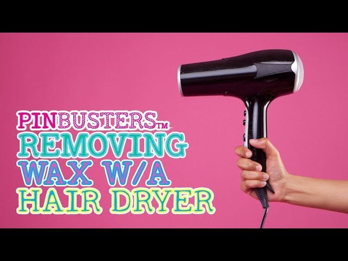 Kerzenwachs auf der Tapete? Föhn und Papiertuch lösen das Problem spurlos - image 2